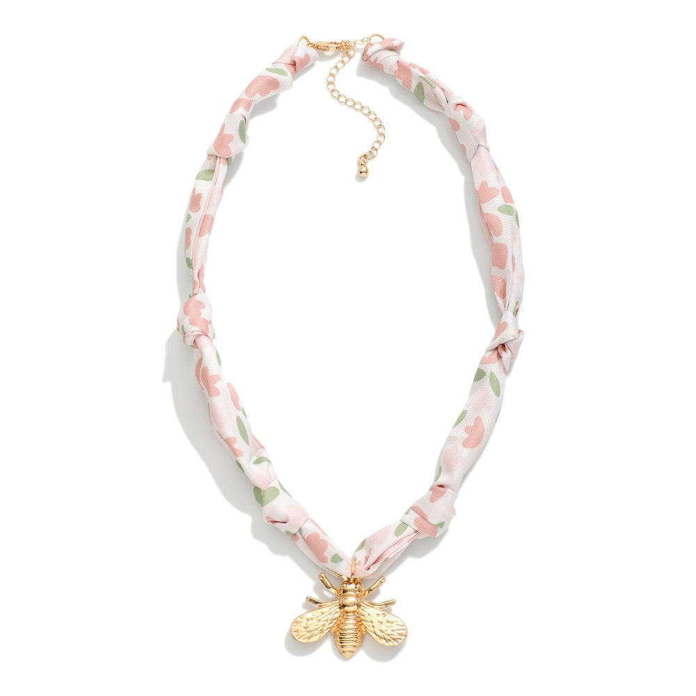 Scarf necklace with metal charm