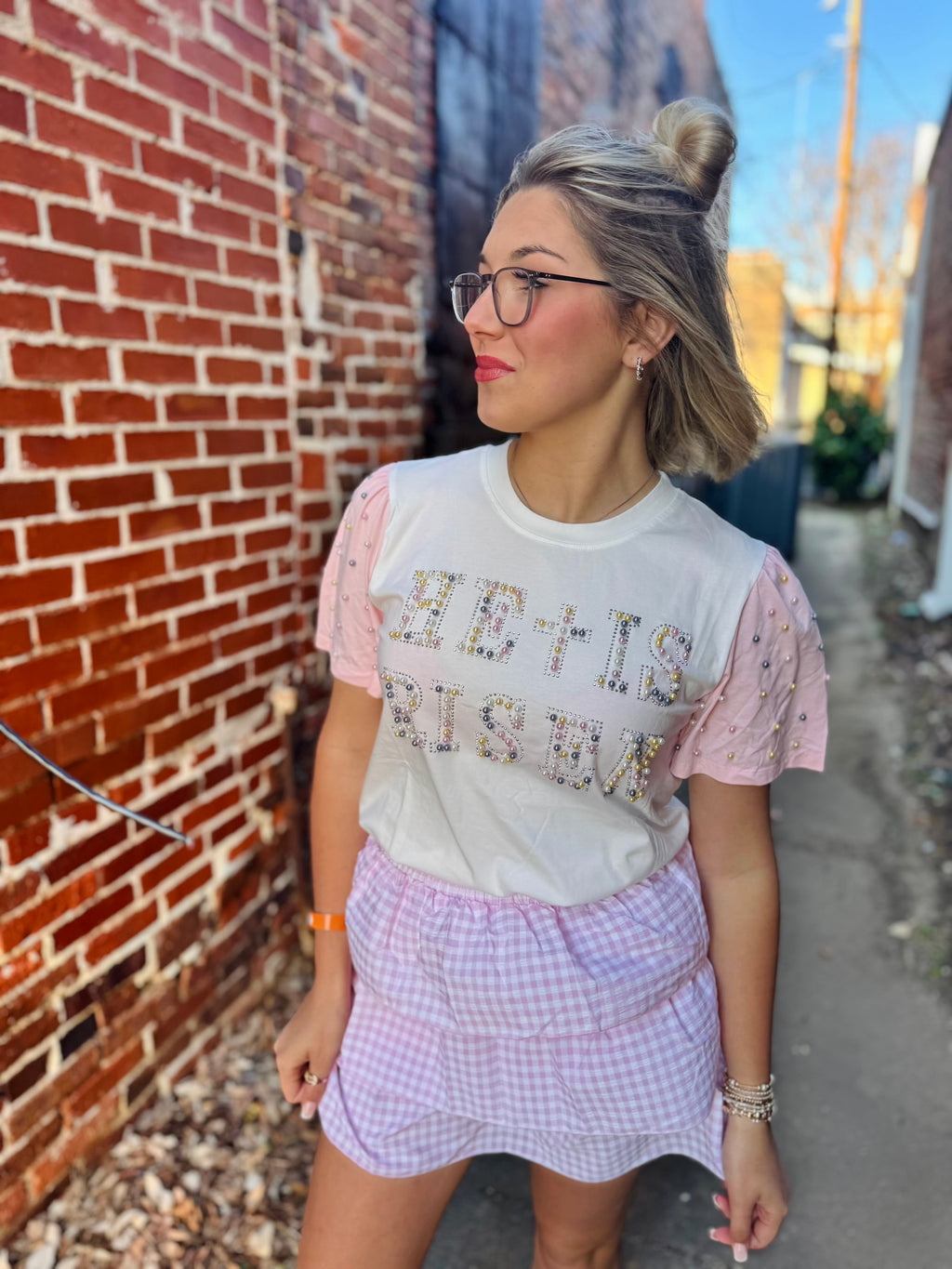 He is Risen Pearl Studs on princess top