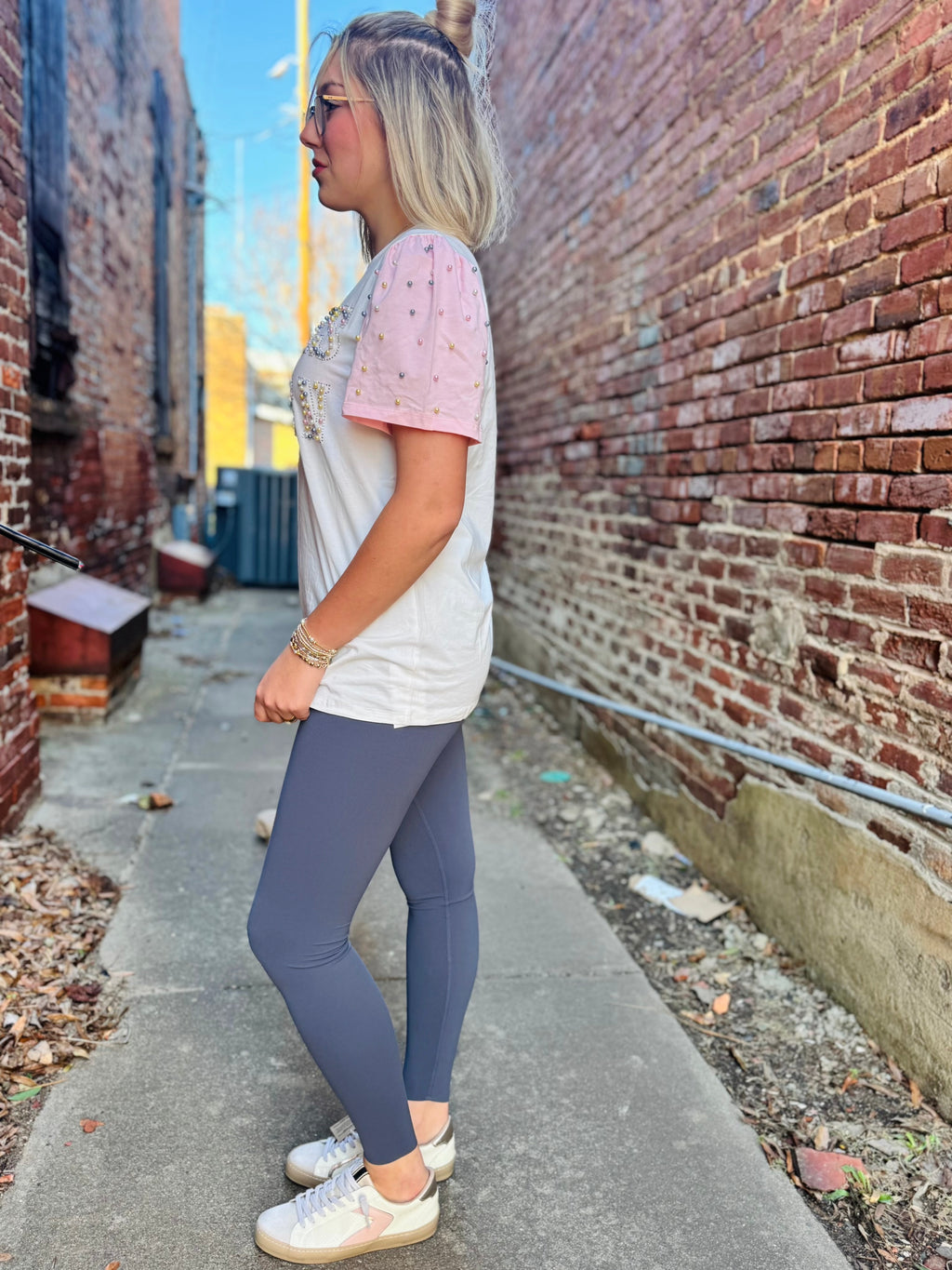 He is Risen Pearl Studs on princess top